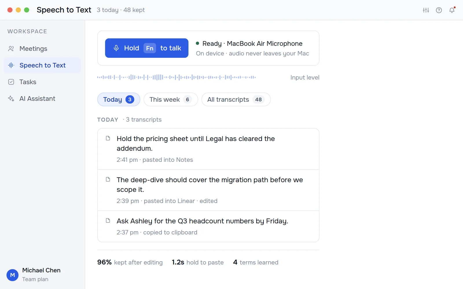 The speech-to-text page with the hold-to-talk control, input level and recent dictations